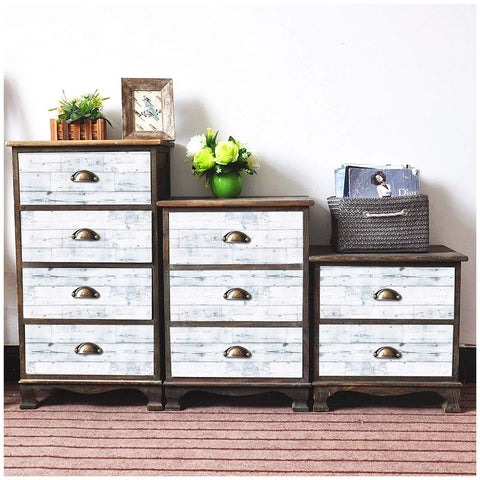 Wooden cabinets with drawers featuring DIY Ready Peel And Stick Shiplap Wallpaper In Light Grey White Distressed Wood Plank Look