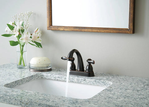 Centerset Chrome Bathroom Faucet For 4 Inch 3 Hole Vanity Sink With Metal Push Pop Drain Assembly And No Fuss Easy DIY Install Model B2596LF Built To Last installed on a granite countertop.