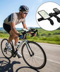 Cyclist with 7.9 Inch Bike Handlebar Extender Aluminum Alloy Bracket Extension For Double Mounts, smartphone attached, countryside view