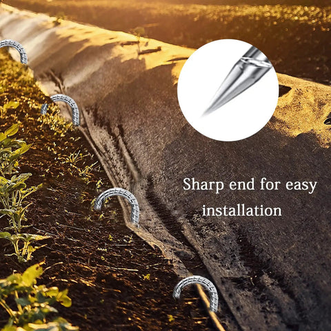 Heavy Duty 12 Inch Galvanized J Hook Ground Anchors Set securing landscape fabric in garden with close-up of sharp end
