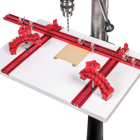 Knockout Rock Solid Micro Dot Drill Press Table Kit With Tight 36 Inch Fence, features red clamps and smooth surface for drilling.
