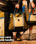 Monster 48L Gear Hauler Tote Bag in recycled nylon with easy carry handles for car trunk storage, outdoor adventure use.