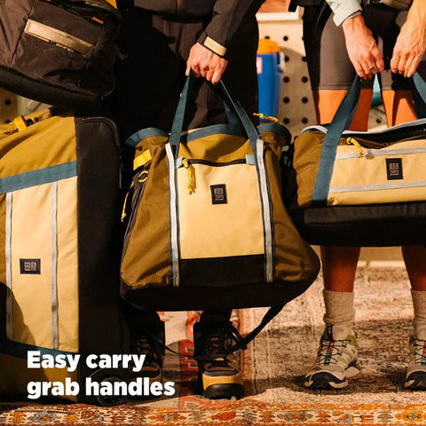Monster 48L Gear Hauler Tote Bag in recycled nylon with easy carry handles for car trunk storage, outdoor adventure use.
