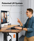 Person using Electric Height Adjustable Standing Desk 48 By 24 Inches Sit Stand Computer Desk For Home Office Rustic Brown