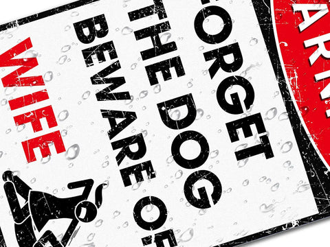 Hella Durable Metal Wall Art Sign For The Man Cave Featuring Funny Forget The Dog Beware Of Wife Quote In Rust Proof Aluminum Garage Decor That Is Legit Tough And Totally Bro Approved 12 By 8 Inch, showing playful warning detail with raindrops.