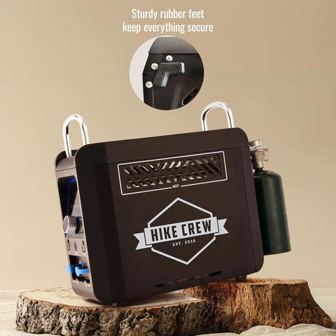 Propane Water Heater And Rechargeable Portable Outdoor Shower System With Shower Head Attachment Delivers Instant Hot Water For Camping, Hiking, Glamping And Vacationing On The Go, shown on a rock with close-up rubber feet inset.