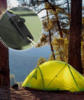 Image showing a green camping tent set up using Heavy Duty Tarp Clips With Locking Thumb Screws For Canopies And Tents, Grip Tight Hold Downs That Will Not Slip, Durable Outdoor Awning Clips For Camping Or Patio, 40 Pack.