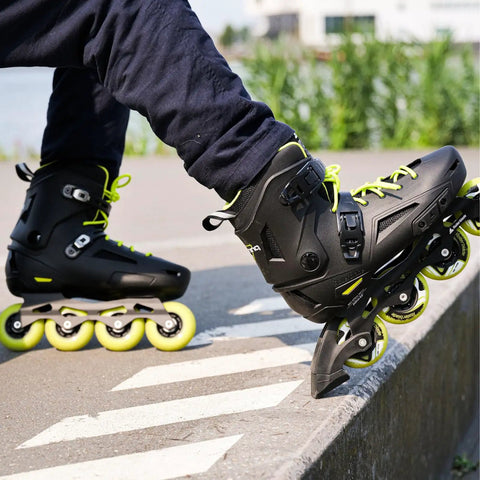 Lightning Inline Skates For Men Urban City Street Ready Black And Yellow on relaxing skater's feet on urban ledge