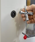 Hand using Handy Universal Control Cabinet Key for Gas, Water, and Electric Shutoff Systems with Slot 10x7 Bit, Phillips PH2, 1/4 in adapter