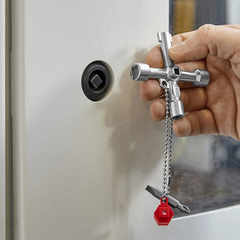 Hand using Handy Universal Control Cabinet Key for Gas, Water, and Electric Shutoff Systems with Slot 10x7 Bit, Phillips PH2, 1/4 in adapter