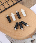 Top Shelf Cabinet Door Repair Pins Heavy Duty Metal Plastic Damper Hardware 20 Pack on wood surface, featuring black and white connectors.