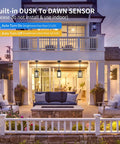 Top Shelf Build And 11 Inch Black Outdoor Pendant Light Comes Loaded With Smart Dusk To Dawn Sensor illuminating patio furniture.