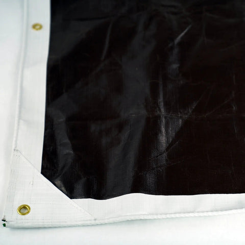 Corner view of Ultra Heavy Duty Waterproof Tarp 12 Ft By 16 Ft 16 Mil Thick With Rope Hem Reinforced Corners Brass Grommets