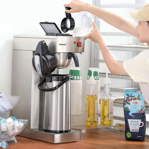 Person operating Commercial Airpot Coffee Brewer With 2.2L 74oz Thermal Carafe Stainless Steel Pour Over Coffee Machine 24 Hour Heat 120V 1450W Dispenser For Cafe Restaurant Cafeteria