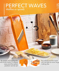 Orange Börner Wave-Waffle Power Line vegetable slicer for crinkle-cut and spirelli cuts, with multiple thickness options