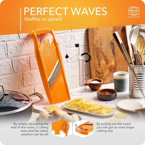 Orange Börner Wave-Waffle Power Line vegetable slicer for crinkle-cut and spirelli cuts, with multiple thickness options