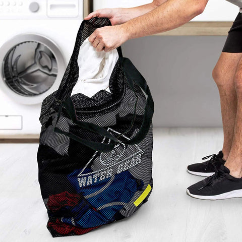Large Mesh Tote Bag With Zipper For Swim Gear, Balls And Aqua Equipment shown used by a person near a laundry area.