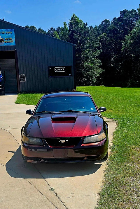 Front view of a car featuring Dead Straight Automotive Colorshift Basecoat Midcoat One Gallon Ready To Roll With Slow Reducer Mix.