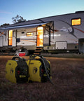Ultralight 2500-Watt Inverter Generator With Quiet Tech, No-Brainer Portable Power For Camping And Home Backup next to RV