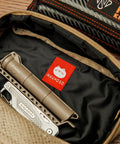 Interior of Durable Travel Packing Cubes Set With Zippers Luggage Organizers For Backpacking Waterproof 500D Nylon Build Tactical Style Packing Cubes To Keep Your Gear Tidy On The Go Essential Travel Organizer Kit with tools visible.