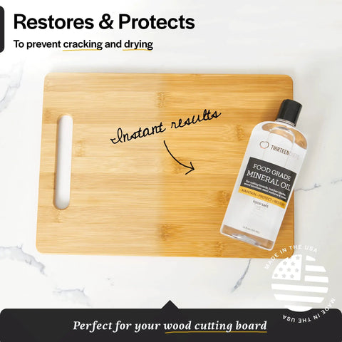 Food Grade Mineral Oil For Wood Cutting Boards, Countertops And Butcher Blocks bottle on bamboo board, protects against cracking.