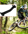 Cyclist on trail with inset of Two Pack Post Mount Disc Brake Adapter For 180mm Rotors, Front Or Rear Mountain Bike Caliper Converter