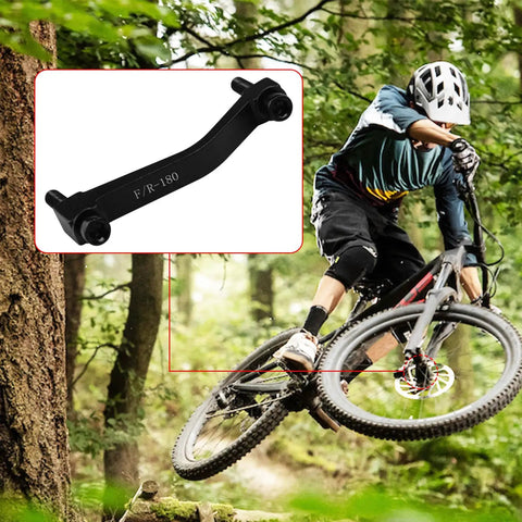 Cyclist on trail with inset of Two Pack Post Mount Disc Brake Adapter For 180mm Rotors, Front Or Rear Mountain Bike Caliper Converter