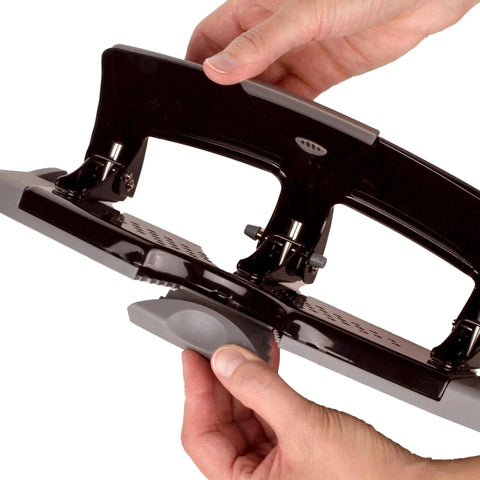 No Sweat Heavy Duty Three Hole Puncher With 20 Sheet Capacity Solid Steel Frame, hands adjusting base for secure grip.