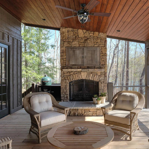 Covered patio with Glencrest 52 Inch Indoor Outdoor LED Ceiling Fan With Light And Pull Chain above seating area.