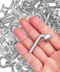 Close-up of 100 Pack Galvanized Pallet Rack Drop Pins M5 Round Head Safety Bolts held in hand, highlighting iron material.