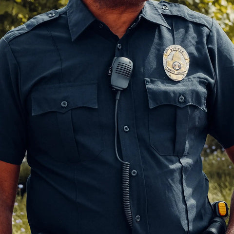 Officer wearing Remote Shoulder Speaker Microphone With Beefed Up Cable For Walkie Talkie Two Way Radio Compatible With CXT195 PX650
