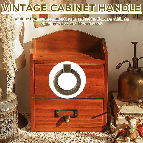 Snag This Dope Set Of Ornate Cabinet Knobs And Pulls With A Slick Bright Brass Finish For Smooth Kitchen Drawer Handles And Stylish Vanity Cup Hardware Featuring A Classic 135Mm Spread. Antique bronze ring cabinet handle on wooden dresser.