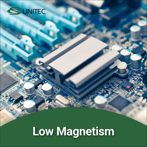 Close-up of a computer circuit board labeled 'Low Magnetism' from Unitec.