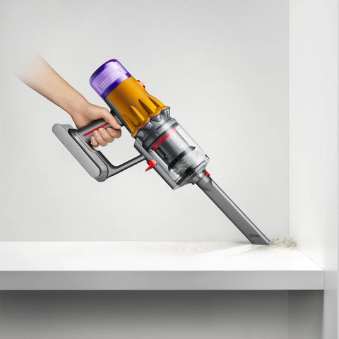 V12 Detect Slim Absolute Cordless Vacuum Cleaner with high suction power cleaning a shelf