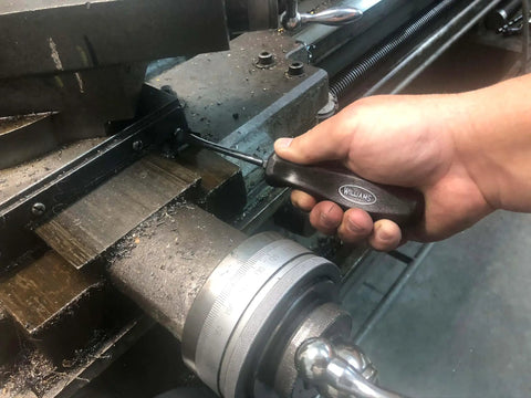 Hand using Endurogrip 6 Piece Phillips Screwdriver Set With Comfort Grip Handles And Thumb Stop Built Tough For Maximum Turning Power