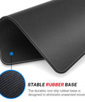 Close-up of Extra Large 8.5 By 11 Inch Mouse Pad For Computer And Gaming With Anti Fray Stitch Edges Premium Textured Waterproof Surface Non Slip Rubber Base Ideal For Laptop Office Or Home Desk Setup Black showing non-slip rubber base and anti-fray edges.