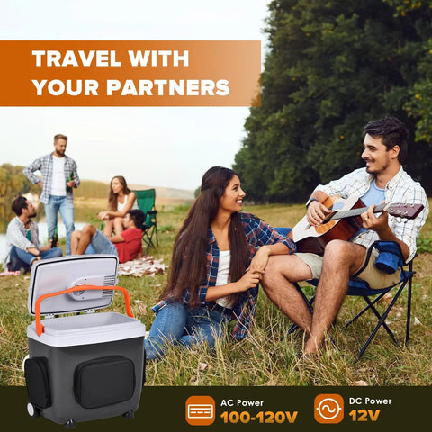 32 Quart Electric Car Cooler Warmer With Smooth Rolling Wheels Keeps Food And Drinks Ice Cold at a camping site with friends.