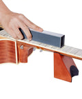 Using Guitar Fret Leveling Kit For Pros And DIY Hobbyists Includes Fret Leveling Beam on neck with wooden cradle support