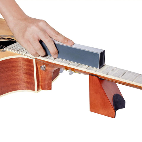Using Guitar Fret Leveling Kit For Pros And DIY Hobbyists Includes Fret Leveling Beam on neck with wooden cradle support