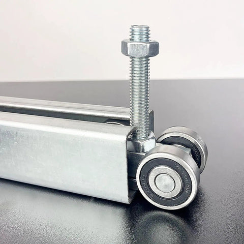 Four Wheel Unistrut Trolley Assembly With M12 Bolts For One And Five Eighths Inch Wide Strut Channel close-up view