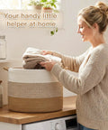 Woman using 70L Cotton Rope Basket For Living Room And Nursery, Boho Woven Toy Box, Kid Safe, Blanket Storage, Laundry Hamper, Brown.