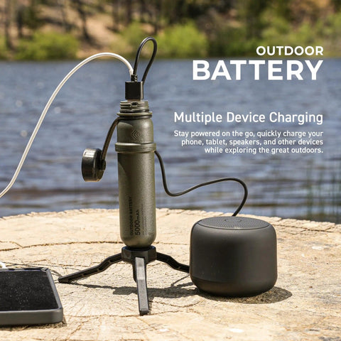 Rugged Outdoor 5000mAh Power Bank With 15W USB C Fast Charge IP67 Waterproof in use charging multiple devices by a lake