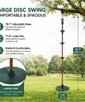 Outdoor Climbing Rope With Platform And Disc Swing Seat Set for trees and backyards shown attached to a tree in a park setting.