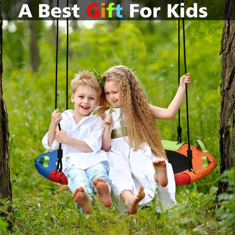 Kids smiling on Saucer Swing 40 Inch Circle Disc With Adjustable Straps 900 Lb Weight Capacity Multicolor Backyard Outdoor Swing For Kids