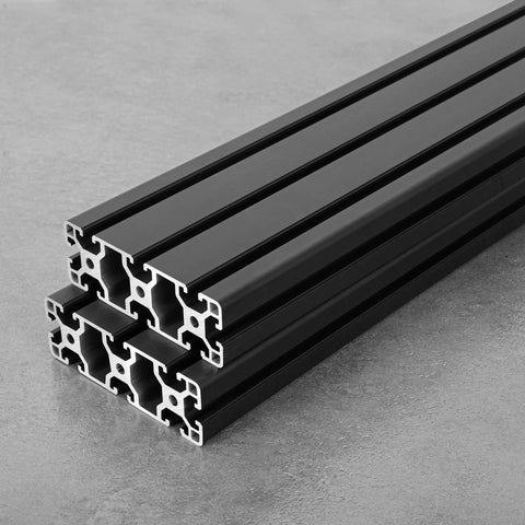40120 T Slot Aluminum Extrusion Profile Black 600mm By 2 stacked on gray surface