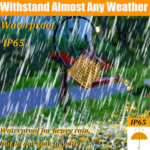 Outdoor waterproof solar lantern in metal watering can shape, hanging from a hook in heavy rain, garden decor ornament.