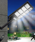 Beefy 800W Solar Street Light With 80000 Lumens, Dusk-to-Dawn, motion sensor, remote control, IP65, wall-mounted at night scene