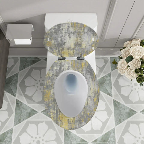 Quiet Close Resin Elongated Toilet Seat for Bathroom on white toilet with decorative gray and yellow design.