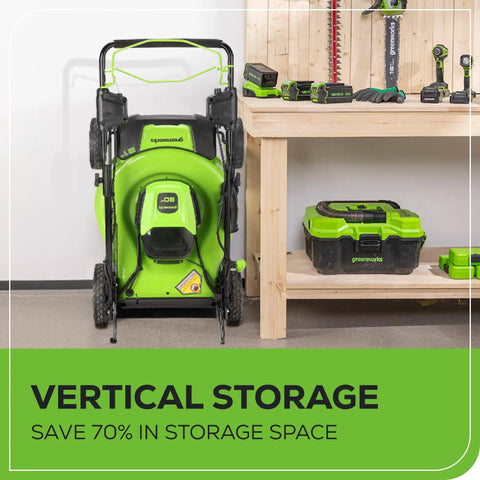 80V Self Propelled 21-Inch Cordless Lawn Mower with Brushless Motor in vertical storage position next to workbench
