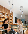 Bakery illuminated by Pendant Light Kit For Kitchen Island With Remote, Dimmable 3000K 4000K 6000K, brushed nickel, clear glass.